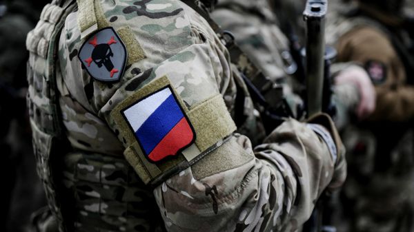 Военнослужащий добровольческого батальона имени Судоплатова в зоне спецоперации - Sputnik Таджикистан
