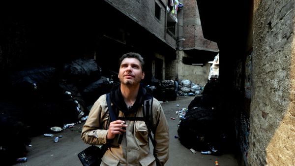 Фотокорреспондент Андрей Стенин на улице Каира Фотокорреспондент Андрей Стенин на улице Каира - Sputnik Таджикистан