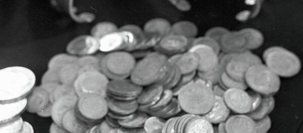 Золотые монеты. Архивное фото - Sputnik Таджикистан