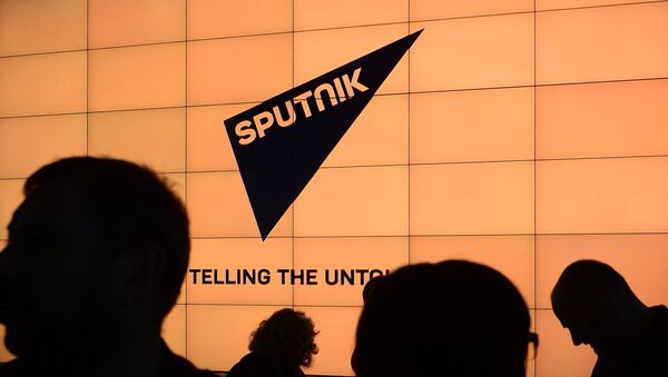 Логотип международного информационного бренда Спутник. Архивное фото - Sputnik Таджикистан