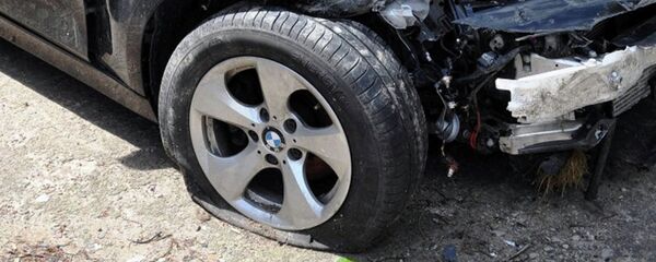 Разбитый автомобиль. Архивное фото - Sputnik Тоҷикистон