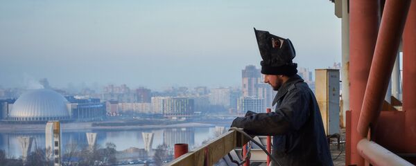 Мигранты на строительном объекте. Архивное фото - Sputnik Тоҷикистон