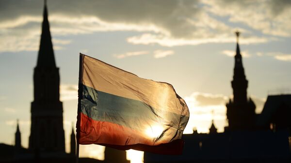 Российский флаг на Красной площади. Архивное фото - Sputnik Таджикистан