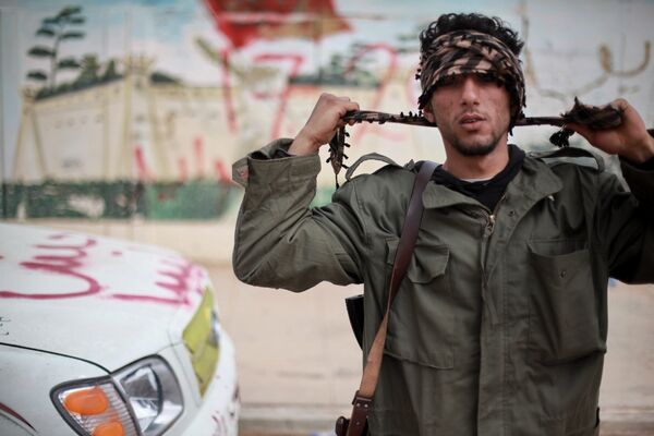 Ливийский город Рас-Лануф захвачен силами оппозиции. Архивное фото - Sputnik Таджикистан