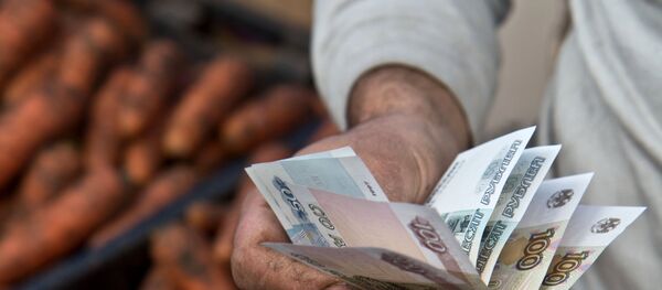 Зарплата мигрантов. Архивное фото Зарплата мигрантов. Архивное фото - Sputnik Тоҷикистон