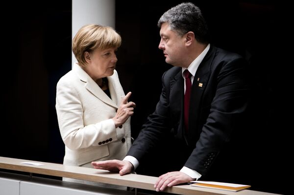 Президент Украины Петр Порошенко и канцлер Германии Ангела Меркель. Архивное фото - Sputnik Таджикистан