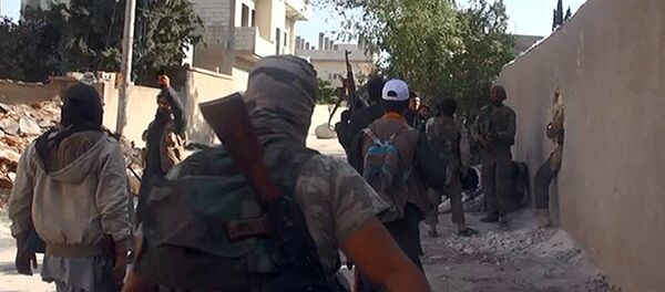 Боевики ИГ в Сирии, архивное фото - Sputnik Тоҷикистон