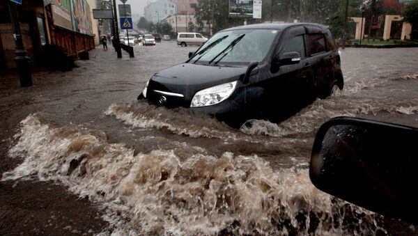 Затопленная улица. Архивное фото - Sputnik Таджикистан