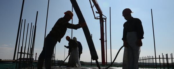 Мигранты работающие на стройках. Архивное фото - Sputnik Тоҷикистон