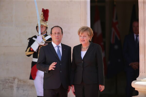 Канцлер ФРГ Ангела Меркель и президент Франции Франсуа Олланд . Архивное фото - Sputnik Таджикистан