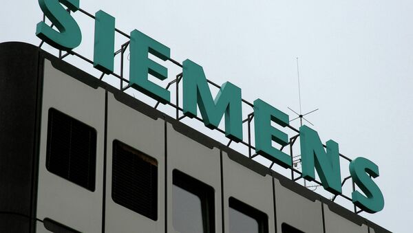 Логотип Siemens, архивное фото - Sputnik Таджикистан