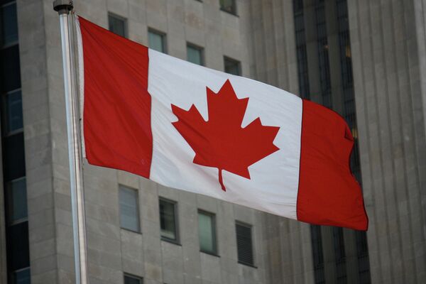 Флаг Канады. Архивное фото - Sputnik Таджикистан
