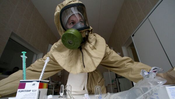 Отработка действий на случай поступления больных, инфицированных Эболой. Архивное фото - Sputnik Таджикистан