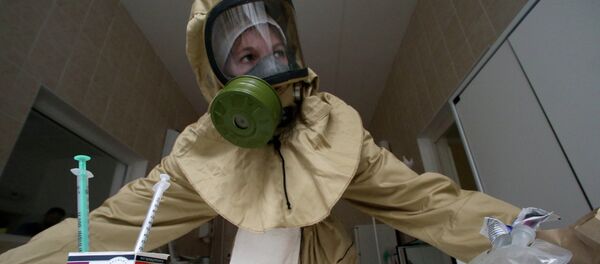 Отработка действий на случай поступления больных, инфицированных Эболой. Архивное фото - Sputnik Таджикистан