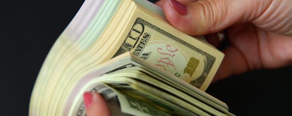 Денежные купюры. Архивное фото Денежные купюры. Архивное фото - Sputnik Тоҷикистон