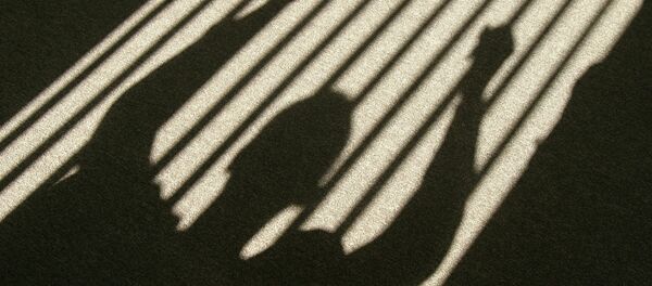 Заключенный за решеткой. Архивное фото - Sputnik Таджикистан