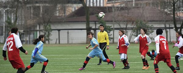 Бозии футбол миёни тимҳои занонаи Ласточка – Регар-ТадАЗ, соли 2015. Акс аз бойгонӣ - Sputnik Тоҷикистон