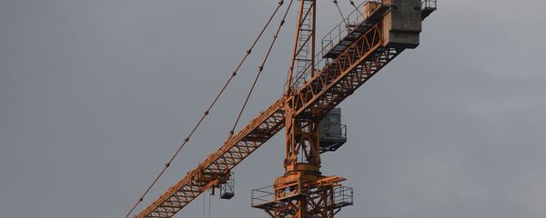 Строительный кран. Архивное фото - Sputnik Таджикистан