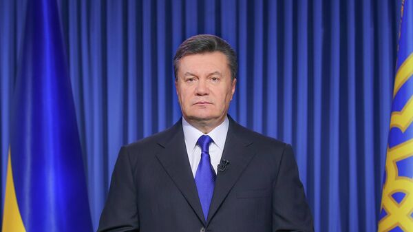 Президент Украины Виктор Янукович выступает с телеобращением в связи с обострением ситуации на Украине. - Sputnik Таджикистан