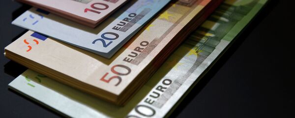 Денежные купюры. Архивное фото Денежные купюры. Архивное фото - Sputnik Таджикистан