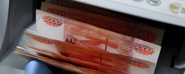 Российские рубли, архивное фото Российские рубли, архивное фото - Sputnik Тоҷикистон