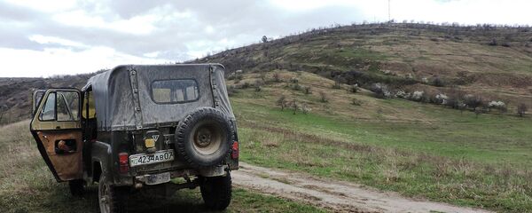 По словам местных жителей в этих холмах Энвер-паша встретил свою смерть По словам местных жителей в этих холмах Энвер-паша встретил свою смерть - Sputnik Таджикистан