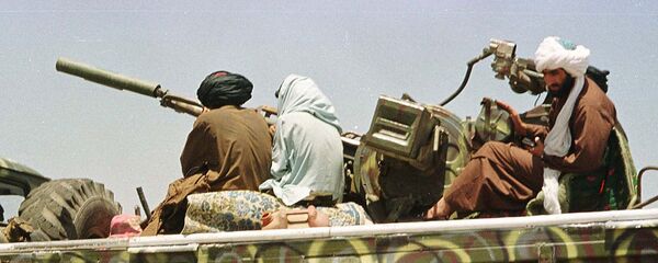 Ҷангиёни Толибон дар роҳ ба сӯи Бағлон. Акс аз бойгонӣ - Sputnik Тоҷикистон