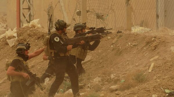 Иракские силовики отражают атаку экстремистов Исламского государства. Архивное фото - Sputnik Таджикистан