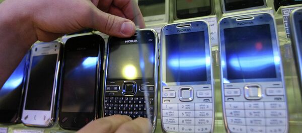 Витрина с сотовыми телефонами. Архивное фото - Sputnik Тоҷикистон