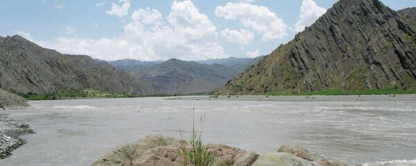 Минтақаи ҳаммарз бо Афғонистон дар рӯдхонаи Панҷ. Акс аз бойгонӣ Минтақаи ҳаммарз бо Афғонистон дар рӯдхонаи Панҷ. Акс аз бойгонӣ - Sputnik Тоҷикистон