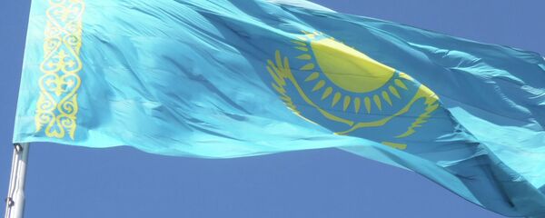 Флаг Казахстана. Архивное фото Флаг Казахстана. Архивное фото - Sputnik Таджикистан