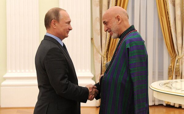 Президент России Владимир Путин принял бывшего главу Афганистана Хамида Карзая - Sputnik Таджикистан
