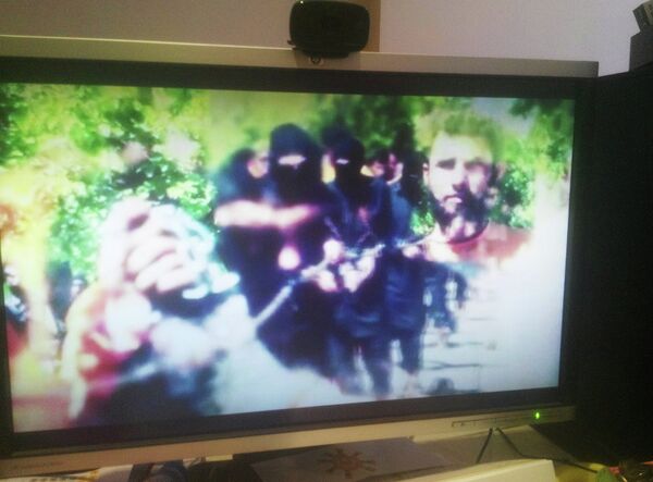Кадр из видео на официальном сайте Джаиш аль-Ислам - Sputnik Таджикистан