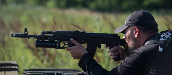 Ополченец батальона Русь ДНР, Архивное фото. Ополченец батальона Русь ДНР, Архивное фото. - Sputnik Таджикистан