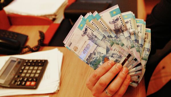 Тенге - национальная валюта Казахстана, архивное фото - Sputnik Таджикистан