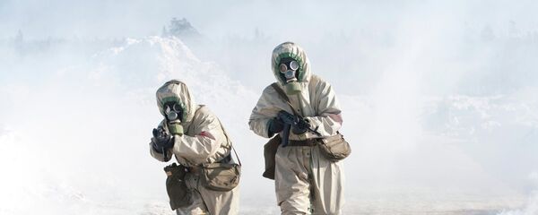 Учения войск, направленные против химического оружия. Архивное фото. - Sputnik Тоҷикистон