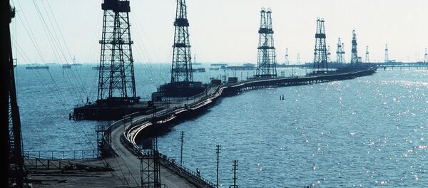 Нефтяные вышки на Каспии. Архивное фото. Нефтяные вышки на Каспии. Архивное фото. - Sputnik Таджикистан
