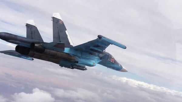 Нанесение российской боевой авиацией ударов по позициям ИГ в Сирии - Sputnik Таджикистан