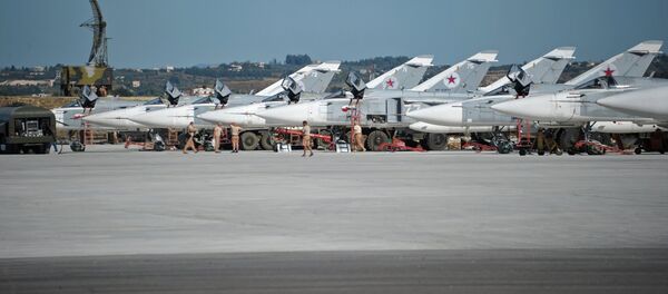 Российская боевая авиация на авиабазе Хмеймим в Сирии. Архивное фото. Российская боевая авиация на авиабазе Хмеймим в Сирии. Архивное фото. - Sputnik Таджикистан