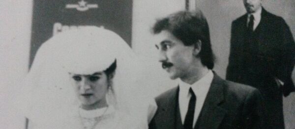 Ориф Бобохонов с женой Ориф Бобохонов с женой - Sputnik Таджикистан