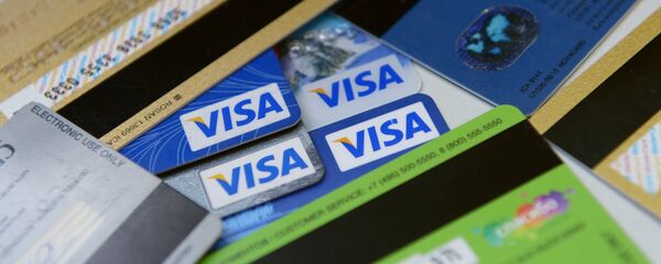 Банковские карты международных платежных систем VISA. Архивное фото Банковские карты международных платежных систем VISA. Архивное фото - Sputnik Тоҷикистон