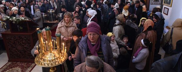 Крещение Господне в Свято-Никольском соборе ДушанбеЮ архивное фото - Sputnik Таджикистан