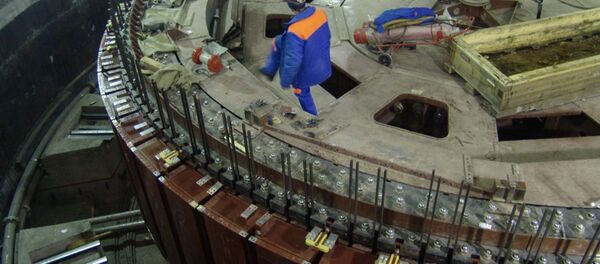 Монтаж колеса гидроагрегата Монтаж колеса гидроагрегата - Sputnik Таджикистан