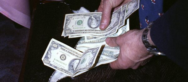 Денежные купюры. Архивное фото - Sputnik Тоҷикистон