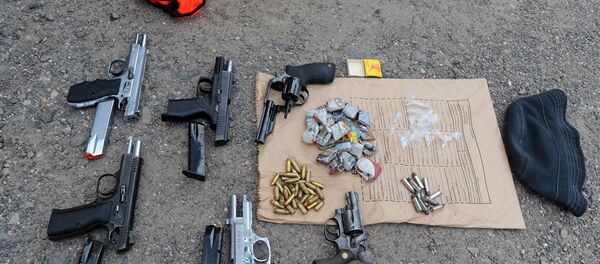 Изъятые оружие и боеприпасы, архивное фото - Sputnik Таджикистан