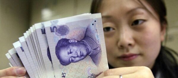 Китайские юани. Архивное фото - Sputnik Таджикистан