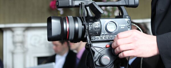 Видеокамера. Архивное фото - Sputnik Таджикистан