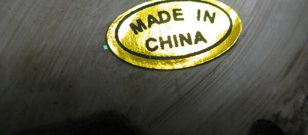 Марка Сделано в Китае. Архивное фото Марка Сделано в Китае. Архивное фото - Sputnik Таджикистан