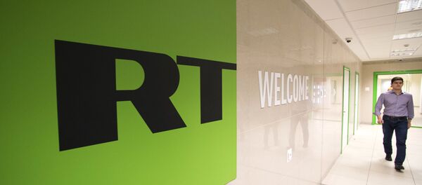 Телеканал Russia Today, архивное фото Телеканал Russia Today, архивное фото - Sputnik Таджикистан