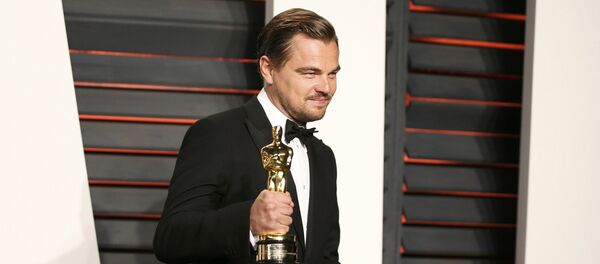 Леонардо Ди Каприо с наградой Оскар - Sputnik Таджикистан